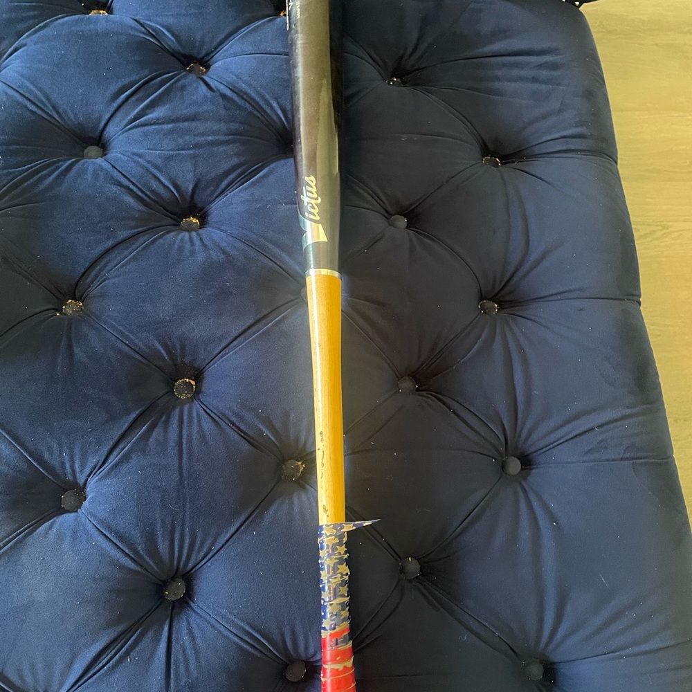 Louisville Slugger Baseball Bat with Red and Black Design